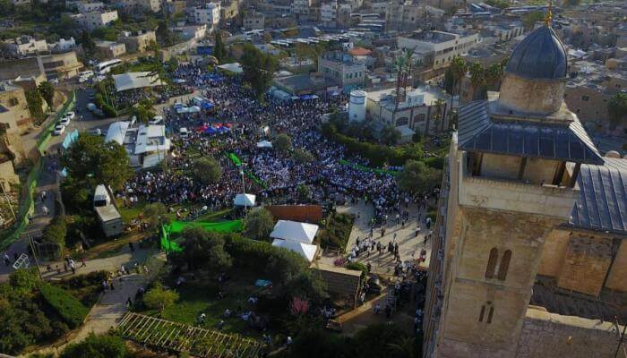 Crowds fill the streets of Hebron on Passover
